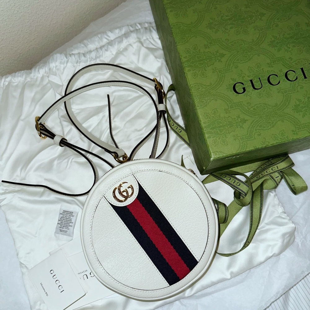 Authentic Gucci Mini Ophidia Round backpack in white color